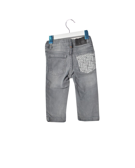 A Grey Jeans from Hugo Boss in size 6-12M for girl. (Front View)