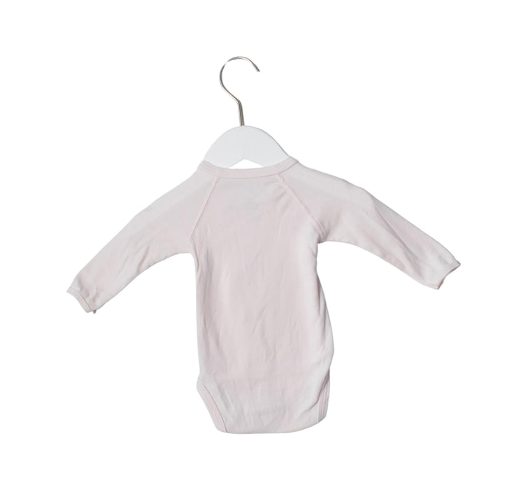 A Pink Long Sleeve Bodysuits from Petit Bateau in size 3-6M for girl. (Back View)