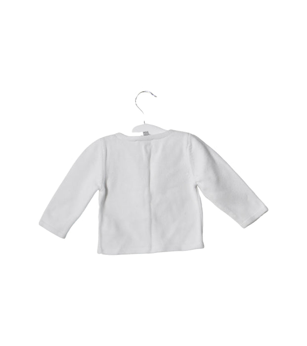 A White Cardigans from Jacadi in size 6-12M for girl. (Back View)