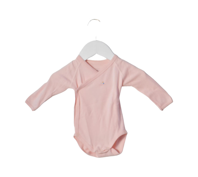 A Pink Long Sleeve Bodysuits from Petit Bateau in size 3-6M for girl. (Front View)