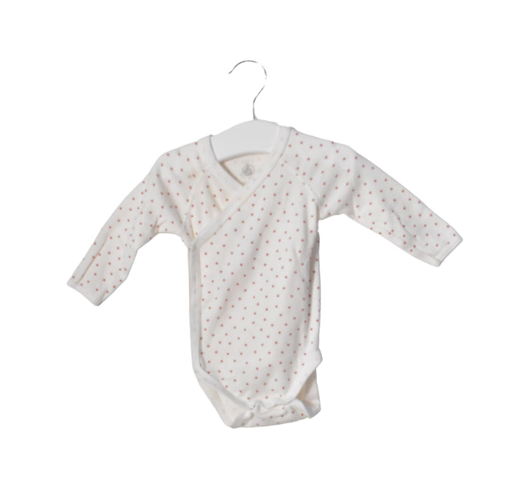 A White Long Sleeve Bodysuits from Petit Bateau in size 3-6M for girl. (Front View)