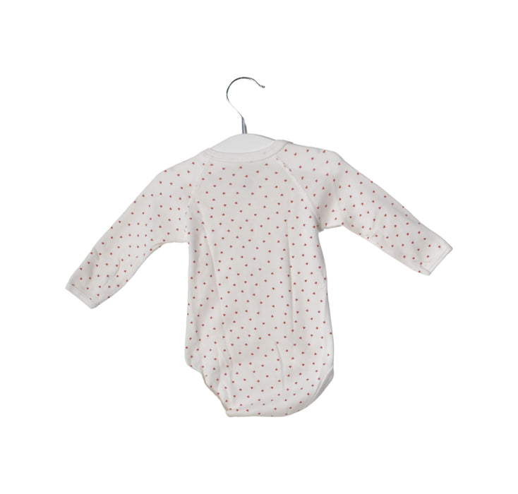 A White Long Sleeve Bodysuits from Petit Bateau in size 3-6M for girl. (Back View)
