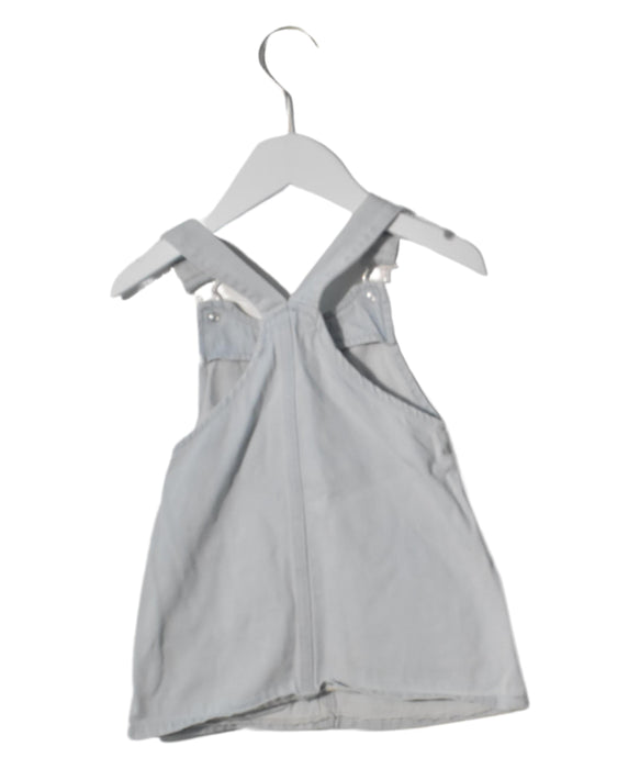 A Blue Sleeveless Dresses from Seed in size 12-18M for girl. (Back View)