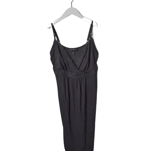 A Navy Sleeveless Dresses from A Pea in the Pod in size S for maternity. (Front View)