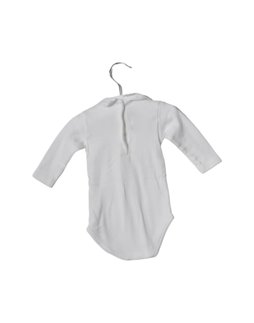 A White Long Sleeve Bodysuits from Bonpoint in size 3-6M for neutral. (Front View)
