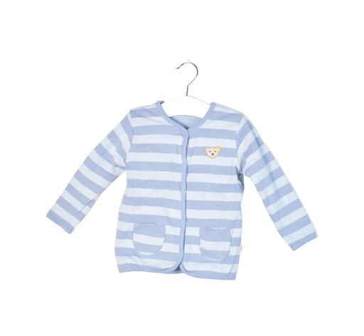 A Blue Cardigans from Steiff in size 6-12M for girl. (Front View)