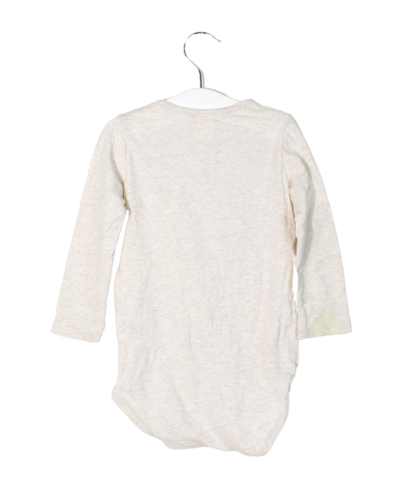A Beige Long Sleeve Bodysuits from Seed in size 12-18M for neutral. (Front View)