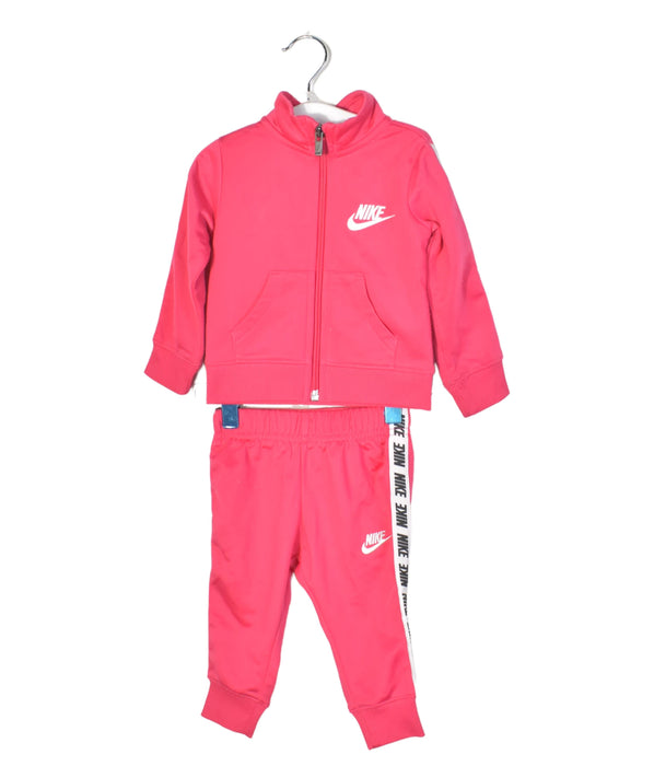 A Pink Pants Sets from Nike in size 12-18M for girl. (Front View)