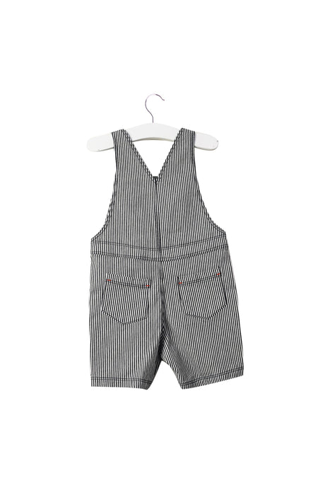A Blue Overall Shorts from Absorba in size 6-12M for boy. (Back View)