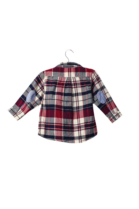 A Navy Shirts from Petit Bateau in size 6-12M for boy. (Back View)