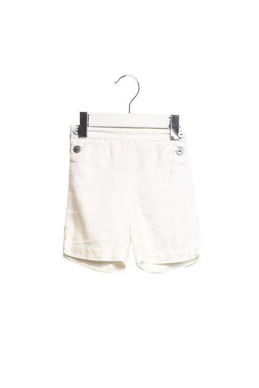 A White Shorts from Jacadi in size 3-6M for girl. (Front View)