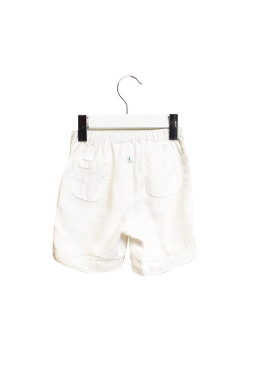 A White Shorts from Jacadi in size 3-6M for girl. (Front View)