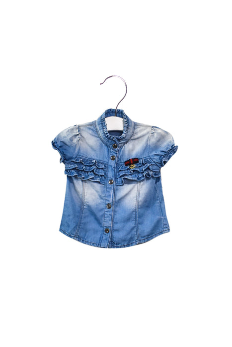A Blue Long Sleeve Tops from Gucci in size 3-6M for girl. (Front View)