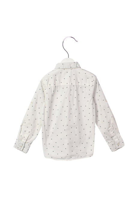 A White Shirts from Seed in size 6T for boy. (Back View)