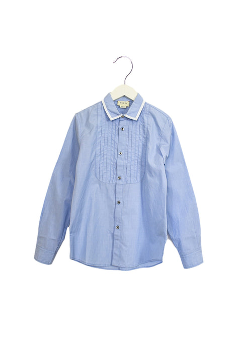 A Blue Shirts from Gucci in size 10Y for boy. (Front View)