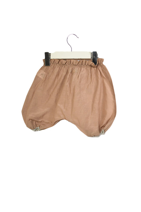 A Beige Shorts from Makie in size 3-6M for girl. (Back View)