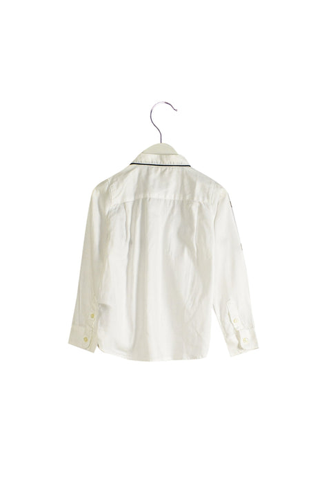 A White Shirts from Jacadi in size 4T for girl. (Back View)