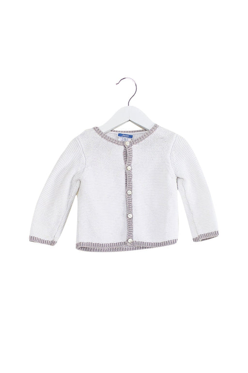 A White Cardigans from Jacadi in size 6-12M for girl. (Front View)