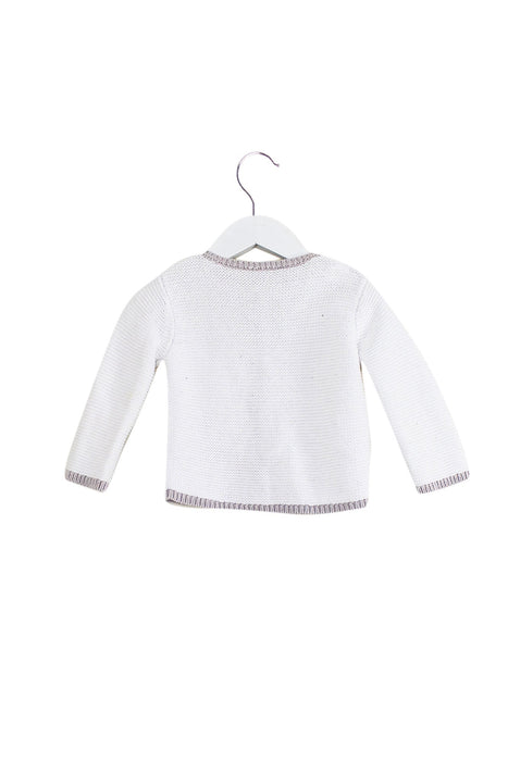 A White Cardigans from Jacadi in size 6-12M for girl. (Back View)