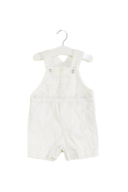 A White Overall Shorts from Jacadi in size 3-6M for boy. (Front View)