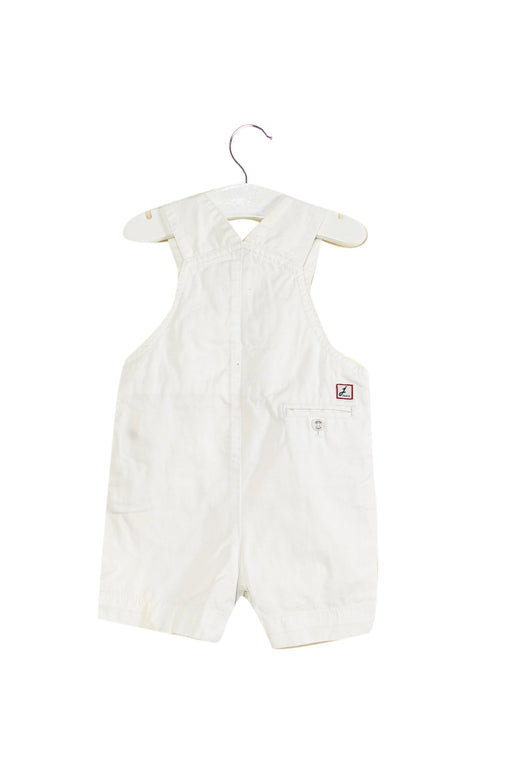 A White Overall Shorts from Jacadi in size 3-6M for boy. (Front View)