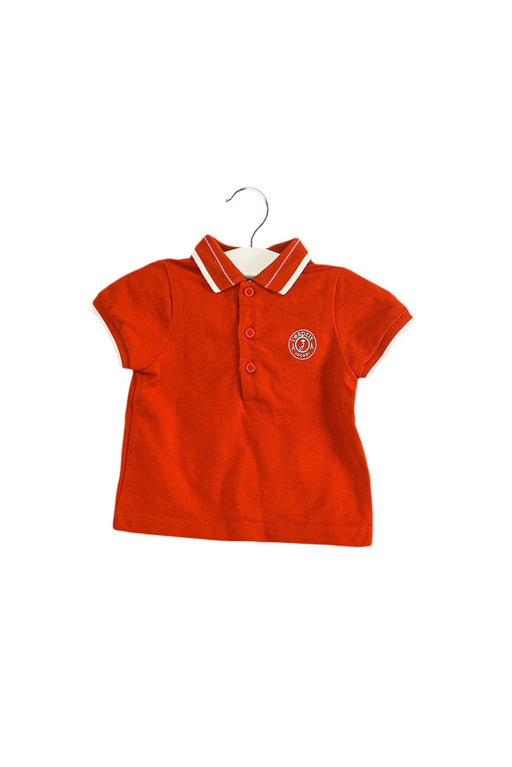 A Orange Short Sleeve Polos from Jacadi in size 3-6M for boy. (Front View)