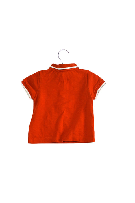 A Orange Short Sleeve Polos from Jacadi in size 3-6M for boy. (Back View)