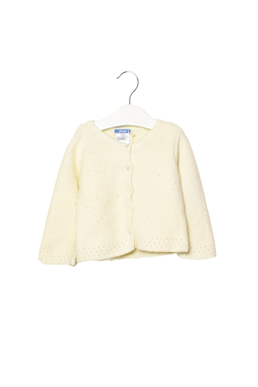 A White Cardigans from Jacadi in size 6-12M for girl. (Front View)