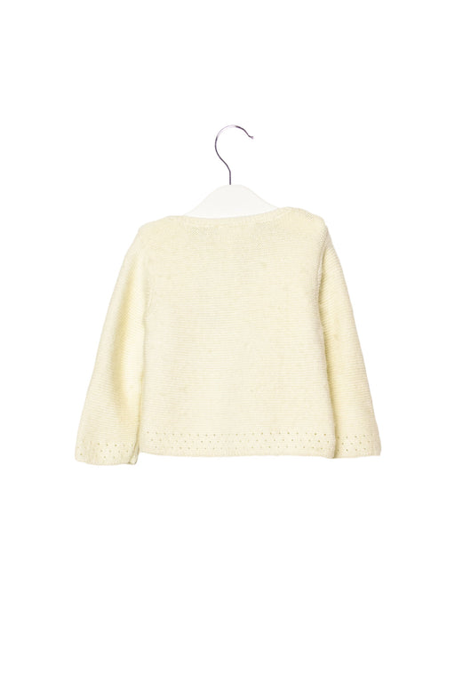 A White Cardigans from Jacadi in size 6-12M for girl. (Front View)