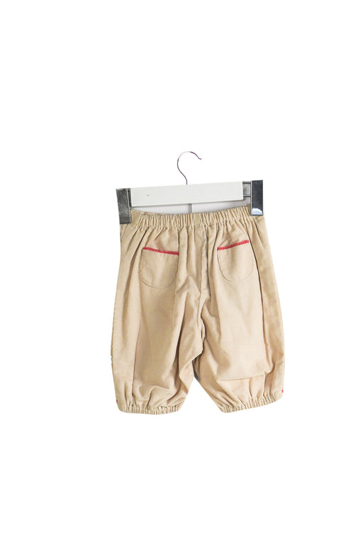 A Beige Casual Pants from Jacadi in size 0-3M for girl. (Front View)