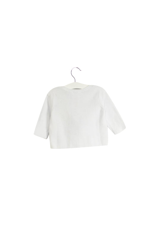 A White Cardigans from Jacadi in size 3-6M for girl. (Front View)