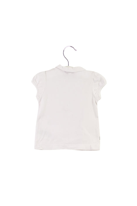 A White Short Sleeve Polos from Jacadi in size 6-12M for girl. (Back View)