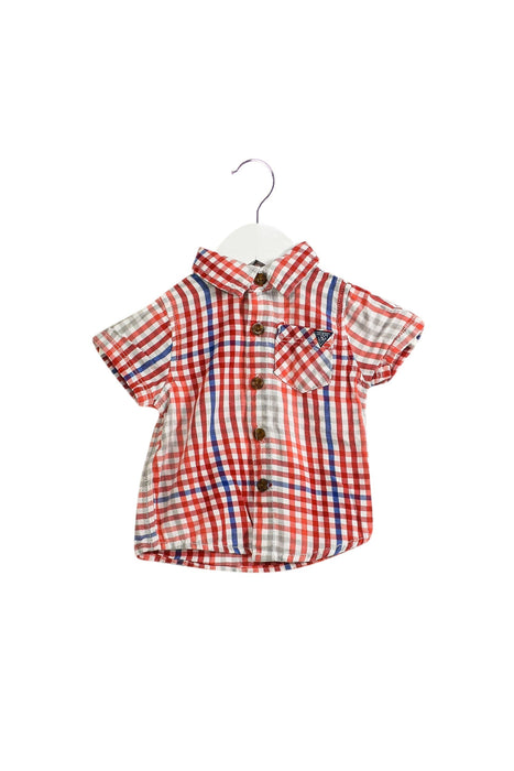 A Red Shirts from Guess in size 3-6M for boy. (Front View)
