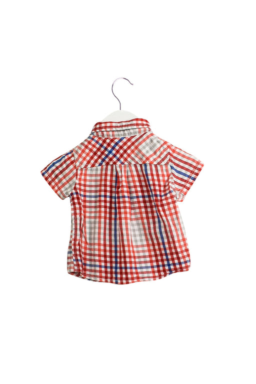 A Red Shirts from Guess in size 3-6M for boy. (Front View)