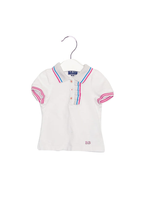 A White Short Sleeve Polos from Nicholas & Bears in size 6-12M for girl. (Front View)