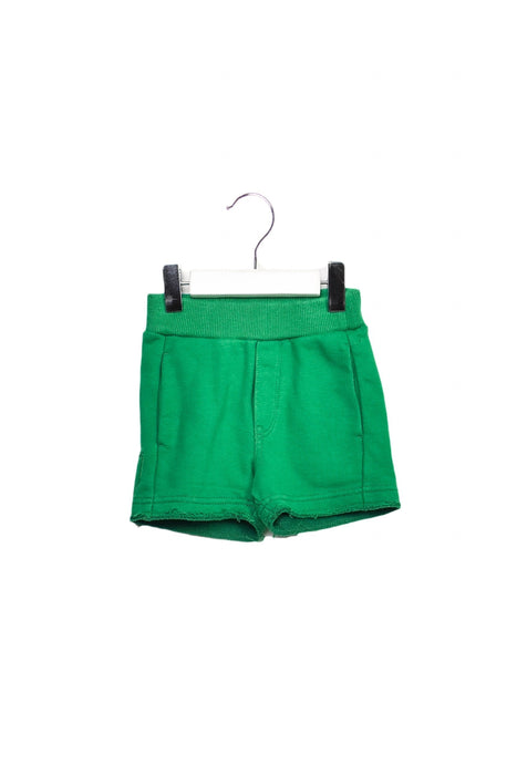 A Green Shorts from Diesel in size 0-3M for girl. (Front View)