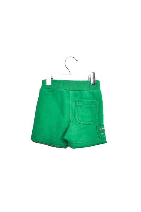 A Green Shorts from Diesel in size 0-3M for girl. (Front View)