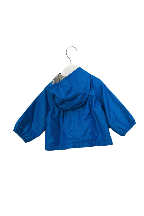 A Blue Lightweight Jackets from Petit Bateau in size 6-12M for boy. (Back View)