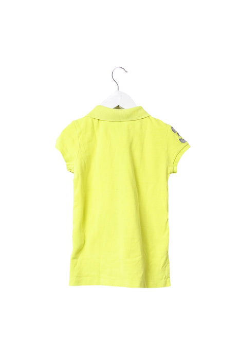 A Yellow Short Sleeve Polos from Ralph Lauren in size 4T for girl. (Back View)