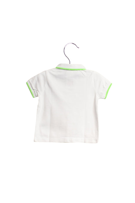 A White Short Sleeve Polos from Jacadi in size 3-6M for boy. (Back View)