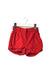 A Red Shorts from Jacadi in size 6-12M for girl. (Front View)