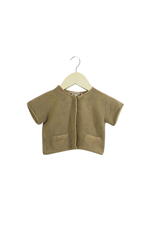 A Ivory Cardigans from Bonpoint in size 6-12M for girl. (Front View)