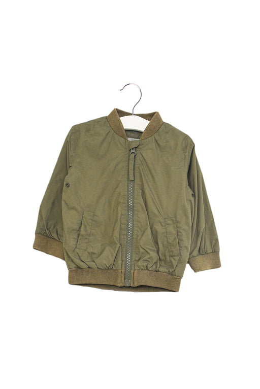 A Green Lightweight Jackets from Petit Bateau in size 6-12M for girl. (Front View)