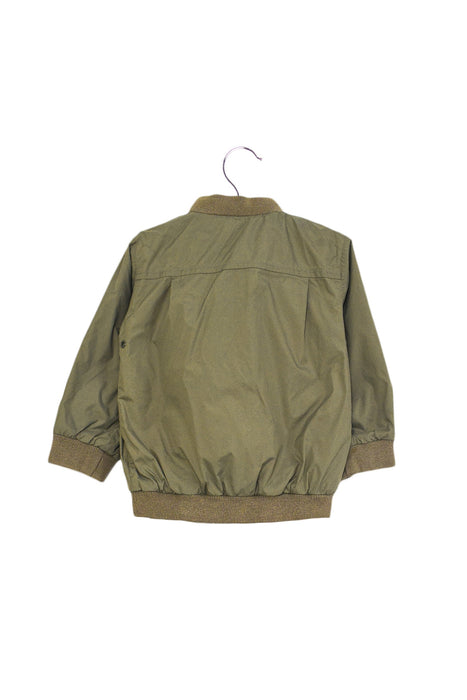 A Green Lightweight Jackets from Petit Bateau in size 6-12M for girl. (Back View)