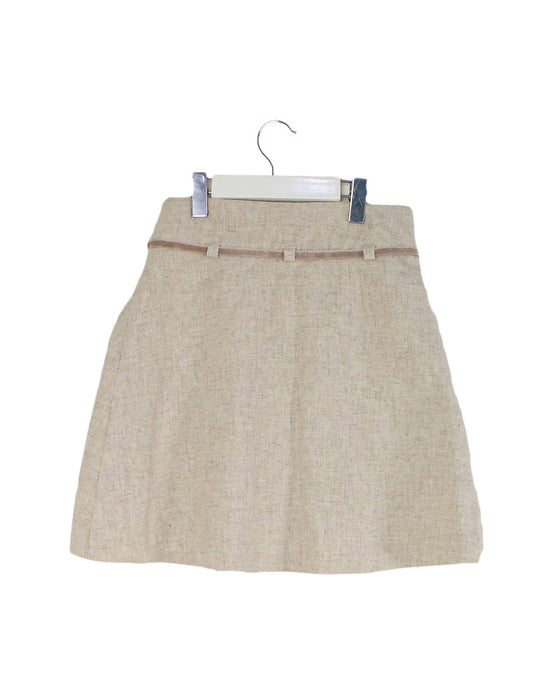 A Ivory Mid Skirts from Jacadi in size 8Y for girl. (Back View)