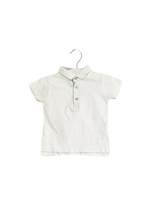 A White Short Sleeve Polos from Laranjinha in size 0-3M for boy. (Front View)