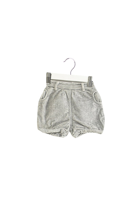 A Grey Shorts from The Little Tailor in size 6-12M for girl. (Front View)