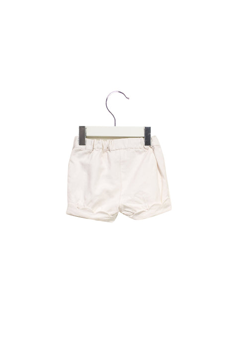 A White Shorts from Jacadi in size 6-12M for girl. (Back View)