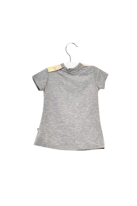 A Grey Short Sleeve T Shirts from Molo in size 3-6M for girl. (Front View)