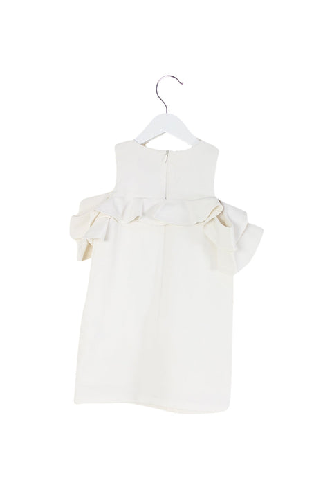 A White Sleeveless Dresses from Bardot Junior in size 4T for girl. (Back View)